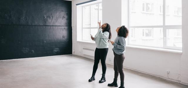 women looking up in an office